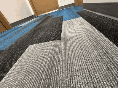 Blue, grey and black commercial carpet tiles