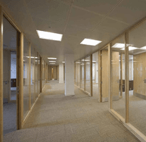 Glazed office partitioning forming a commercial corridor