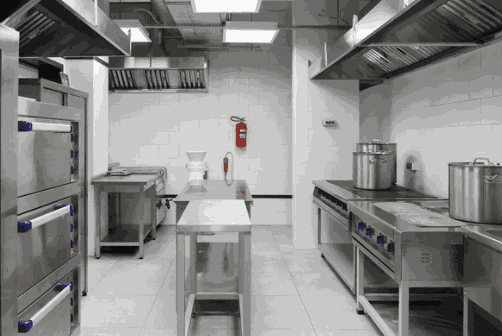 Ceramic wall and floor tiling in a commercial kitchen